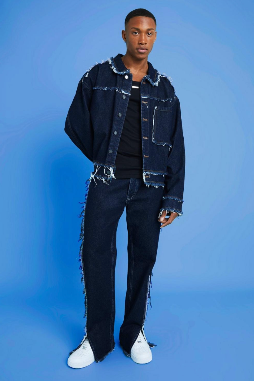 RELAXED FIT FRAYED SEAM JEANS WITH SPLIT HEM